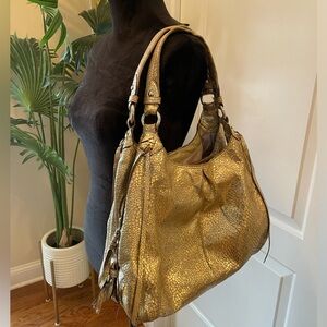 Coach Gold Sachel bag